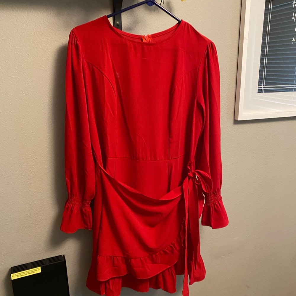 Red Knee length dress - Long sleeves zips in back and wraps around the waist.